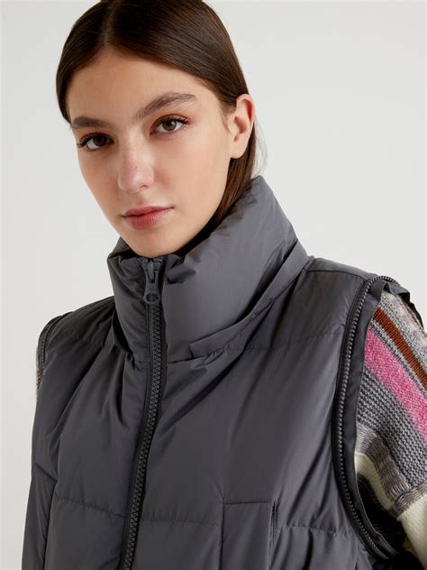 puffer jacket with detachable sleeves.